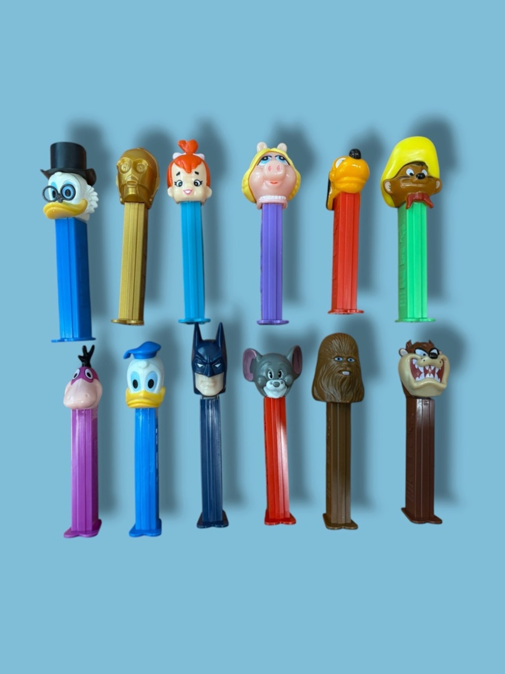 Lot of 12 Vintage PEZ Dispensers